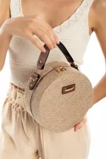 Sac à bandoulière rond en paille Sac à bandoulière rond en paille