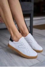 Baskets rétro à semelles détaillées blanches et noires