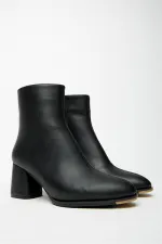 Bottes et bottines noires à talons hauts pour femme – Modèle élégant à porter au quotidien avec fermeture éclair
