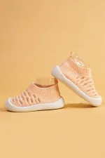 Chaussures premiers pas pour bébé roses