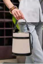 Sac seau à main et à bandoulière en toile avec coutures contrastées - Noir