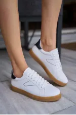 Baskets rétro à semelles détaillées blanches et noires