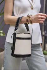 Sac seau à main et à bandoulière en toile avec coutures contrastées - Noir