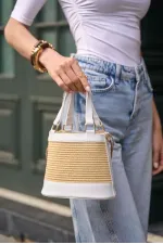 Sac seau à main et à bandoulière de style bohème en paille blanche Sac seau à main et à bandoulière de style bohème en paille blanche