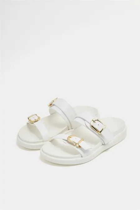 Chaussons tendance à double boucle blancs