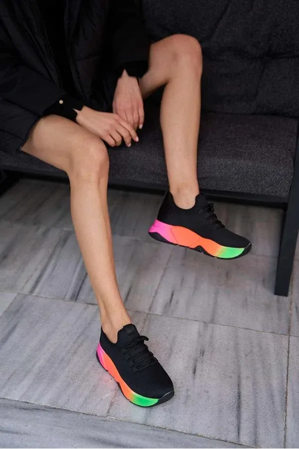 Baskets montantes en maille et chaussures de sport décontractées noires