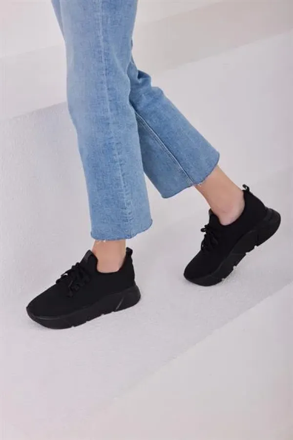 Baskets montantes en maille et chaussures de sport décontractées, noires