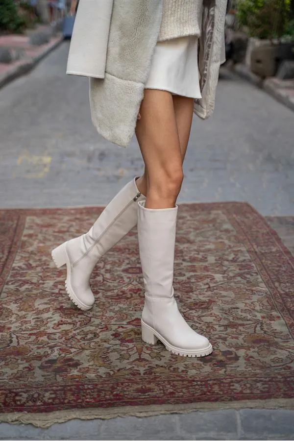 Bottes beiges à talons hauts