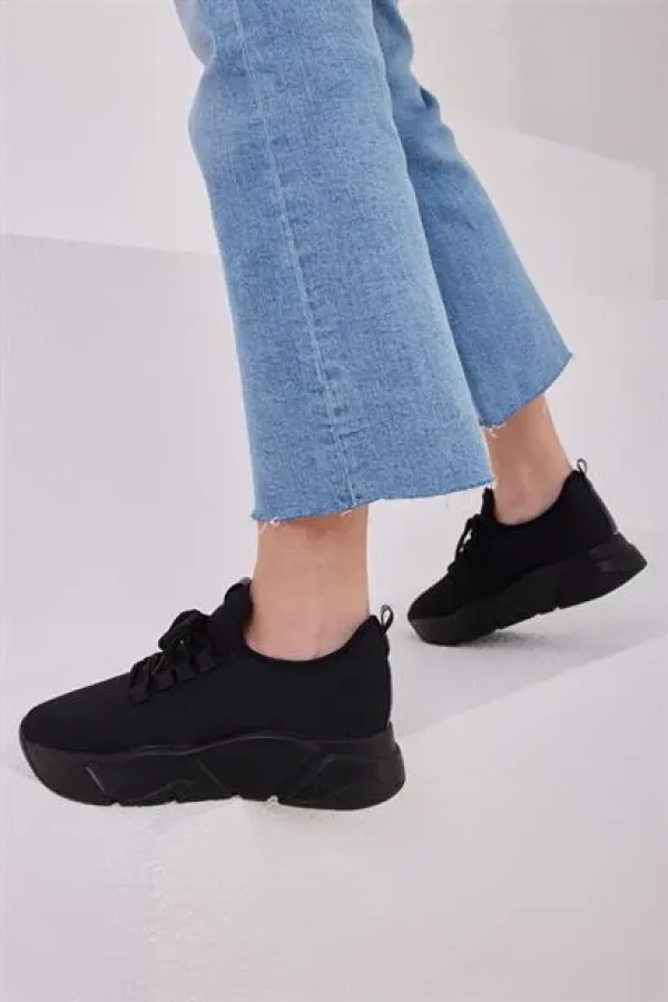 Baskets montantes en maille et chaussures de sport décontractées, noires