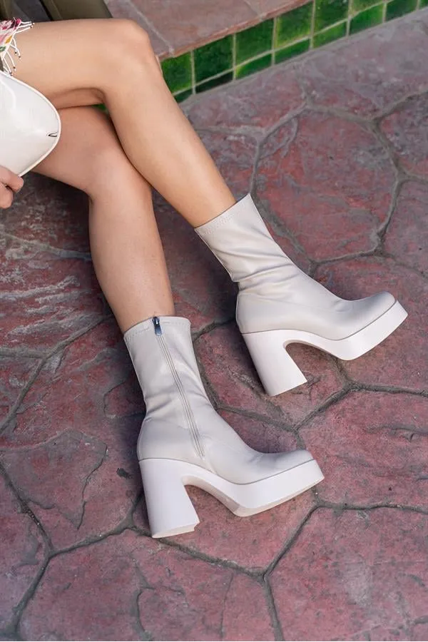 Bottines à semelles compensées beiges