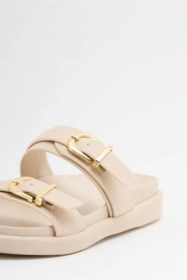 Chaussons tendance à double boucle crème