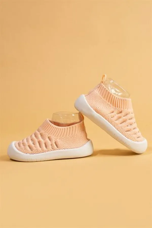 Chaussures premiers pas pour bébé roses