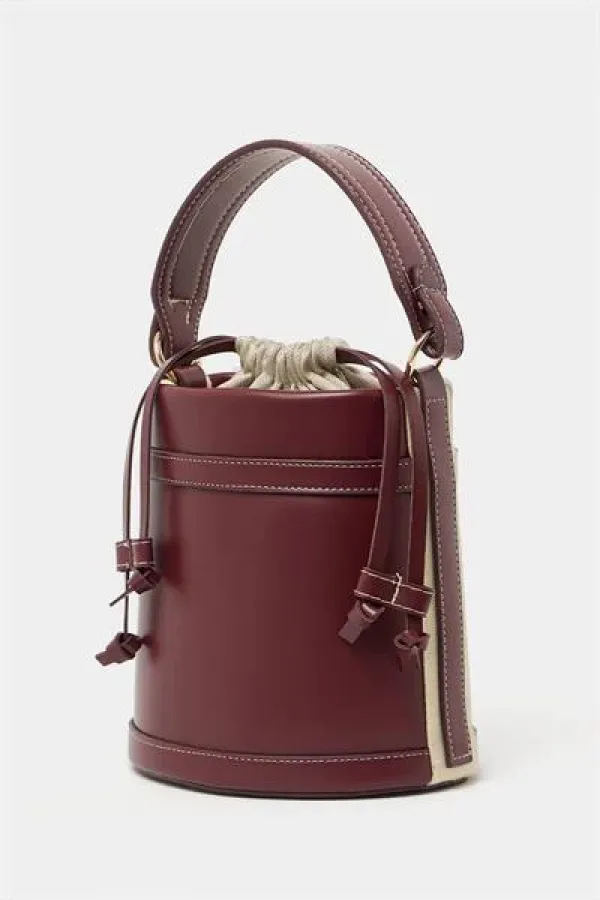 Sac seau à coutures contrastées bordeaux, porté main ou bandoulière