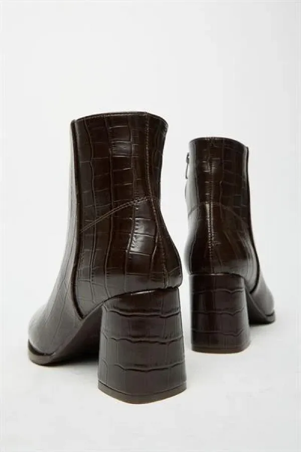 Bottes et bottines en crocodile marron