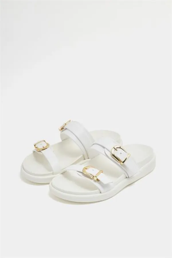 Chaussons tendance à double boucle blancs