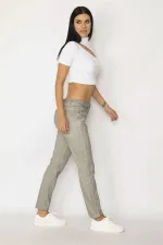 Pantalon pour femme en gabardine délavée kaki avec bonnets à boutons métalliques