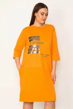 KADIN ORANJ TAŞ VE LAK DETAYLI ELBİSE