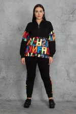 KAPŞONLU FERMUAR VE BASKI DETAYLI KUŞGÖZLÜ SWEATSHİRT PANTOLON TAKIM