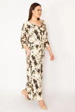 KADIN KAHVE BATİK DESENLİ BEL KISMI LASTİK VE CEP DETAYLI GENİŞ PAÇALI TULUM