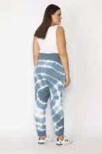 Kadın Mavi İçi Şardonlu 3 İplik Kumaş Bel Ve Paça Lastikli Batik Desenli Pantolon 65N29151