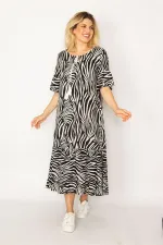 Kadın Siyah Dokuma Viskon Kumaş Etek Ucu Katlı Kolları Volanlı Uzun Elbise 65N34262