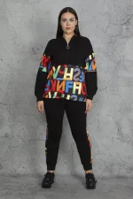 KAPŞONLU FERMUAR VE BASKI DETAYLI KUŞGÖZLÜ SWEATSHİRT PANTOLON TAKIM