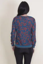 BLOUSE EN MOUSSELINE AVEC DÉTAILS CÔTELÉS