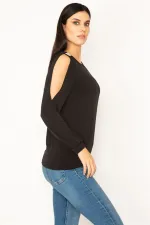 BLOUSE AVEC MANCHES ET ÉPAULES DÉTAILLÉES DE PIERRES