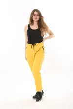 Kadın Büyük Beden Sarı Kuşgözü Bağcık Ve Lastikli Fermuarlı Cep Detaylı Spor Pantolon 65N37567