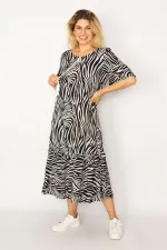 Kadın Siyah Dokuma Viskon Kumaş Etek Ucu Katlı Kolları Volanlı Uzun Elbise 65N34262