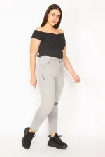 Kadın Gri Likralı Kot Yırtık Detaylı 5 Cepli Skınny Pantolon 65N29525
