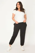 Kadın Gri Pamuklu Kumaş İçi Şardon Paça Ve Bel Lastikli Cep Detaylı Eşofman Alt  65N30436