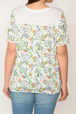 KADIN KEMİK PAMUKLU KUMAŞ BİSİKLET YAKALI ETEK UCU LASTİKLİ ÇİÇEK DESENLİ BLUZ