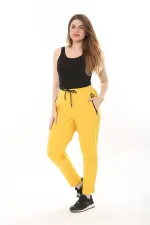 Kadın Büyük Beden Sarı Kuşgözü Bağcık Ve Lastikli Fermuarlı Cep Detaylı Spor Pantolon 65N37567