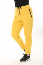 Kadın Büyük Beden Sarı Kuşgözü Bağcık Ve Lastikli Fermuarlı Cep Detaylı Spor Pantolon 65N37567