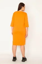 KADIN ORANJ TAŞ VE LAK DETAYLI ELBİSE