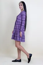 ROBE À CARREAUX AVEC TAILLE ÉLASTIQUE ET OURLET À PLANCHER