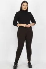 KADIN SİYAH PAÇASI TAŞ DETAYLI TAYT PANTOLON