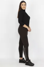 KADIN SİYAH PAÇASI TAŞ DETAYLI TAYT PANTOLON