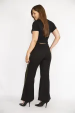 Kadın Siyah Büyük Beden Yırtmaç Detaylı Geniş Paçalı Yan Şeritli Eşofman Alt