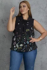 Kadın Siyah Yaka Detaylı Etek Ucu Lastik Detaylı Kolsuz Çiçek Desenli Bluz