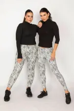 LEGGINGS FEMME À MOTIF ZÉBRÉ NOIR