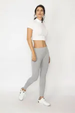 LEGGINGS GRIS POUR FEMME AVEC DÉTAILS EN PIERRE ET FERMETURE ÉCLAIR