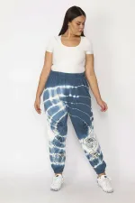 Kadın Gri İçi Şardonlu 3 İplik Kumaş Bel Ve Paça Lastikli Batik Desenli Pantolon 65N29150