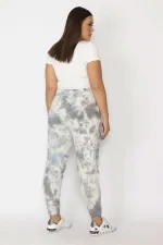 Kadın Gri İçi Şardonlu 3 İplik Kumaş Bel Ve Paça Lastikli Batik Desenli Pantolon 65N29150