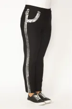 Kadın Siyah Süs Cep Ve Yanları Lak Baskı Beli Lastikli Dalgıç Kumaş Likralı Pantolon 65N27814