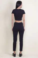 PANTALON À POCHES ÉLASTIQUES À TAILLE À MOTIFS SUR LE DEVANT