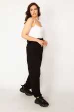 Kadın Siyah Beli Ve Paçaları Lastik Detaylı Rahat Kesim Cepli Spor Pantolon 65N33763