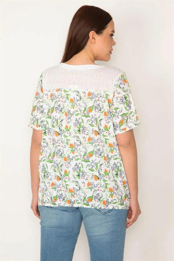 KADIN KEMİK PAMUKLU KUMAŞ BİSİKLET YAKALI ETEK UCU LASTİKLİ ÇİÇEK DESENLİ BLUZ