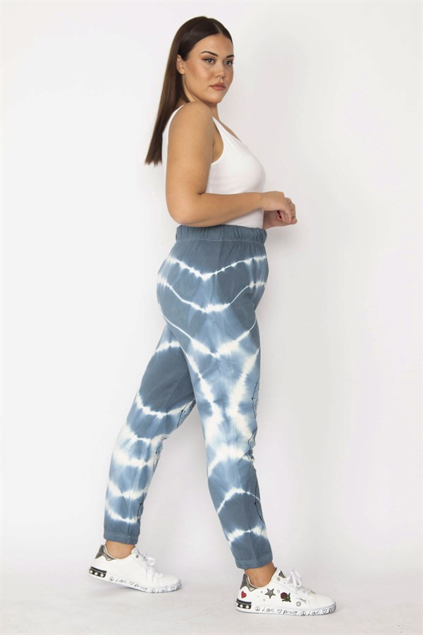 Kadın Mavi İçi Şardonlu 3 İplik Kumaş Bel Ve Paça Lastikli Batik Desenli Pantolon 65N29151